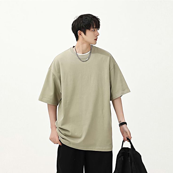 This oversized drop shoulder t-shirt is perfect for a laid-back casual look. The comfortable fit allows you to wear it alone or layer it over or under other items. Its versatility makes it an ideal choice for any occasion, easily matching with any type of pants.
Gender: MenMaterial: CottonClothing Length: RegularSleeve Length: Short Sleeve Style: Drop ShoulderCollar: Round Neck Oversized Drop Shoulder T-shirt For Everyday, Casual Solid Color Boxy Fit T-shirt, Solid Color Oversized Urban T-shirt, Urban Oversized Solid T-shirt, Oversized Plain T-shirt For Streetwear, Plain Cotton T-shirt With Drop Shoulder, Cotton Plain T-shirt With Drop Shoulder, Casual Boxy Fit T-shirt For Everyday, Cotton Drop Shoulder Plain T-shirt