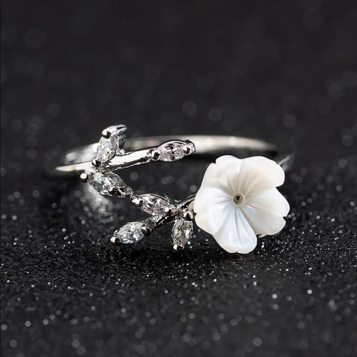 Elegant Silver Plated Flower Ring. Engagement Ring Adjustable Spring Wedding Flower Ring, Delicate Flower Ring For Spring, Flower Shaped Birthstone Ring, Spring White Flower Shaped Ring, White Flower Ring For Spring, Spring Flower Promise Ring, White Wedding Jewelry For Spring, Spring White Flower Ring, Spring Wedding White Jewelry