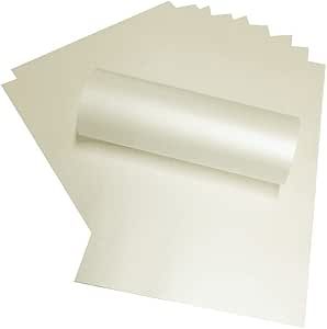 four sheets of white paper stacked on top of each other