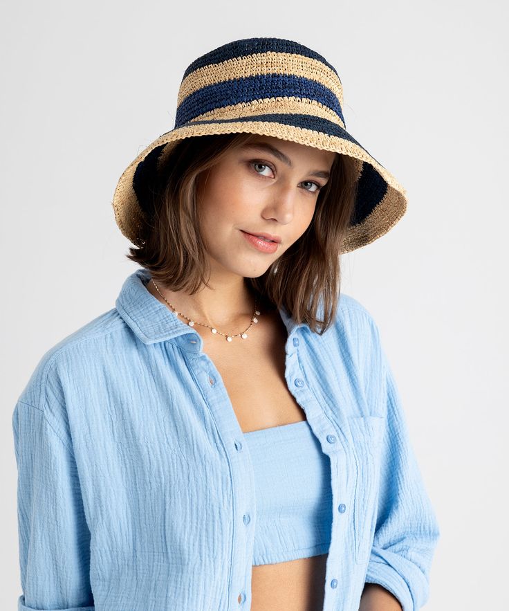 In subtle neutrals or beachy blue, this packable hat is the perfect companion on sunny vacations. Roll it up, put it in your bag, and unroll when you’ve arrived for a chic finishing touch.​﻿ Sizing: One Size-OS Fabrication: 100% raffia Made in: China Sunny Vacation, Packable Hat, Raffia Hat, Winter Accessories, Blue Sea, Best Sellers, Sunnies, Bucket Hat, Straw