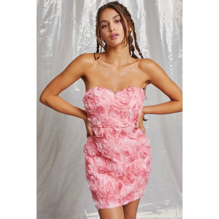 Rock this flirty Floral Lace Dress and bloom with confidence! This pink mini dress features stunning floral applique lace and a trendy tube style. With its playful design, you'll make a statement anywhere you go. Pink Strapless Mini Dress For Date Night, Feminine Mini Dress With Sweetheart Neckline For Homecoming, Feminine Sweetheart Neckline Mini Dress For Homecoming, Pink Floral Applique Dress With Sweetheart Neckline, Pink Floral Applique Mini Dress For Summer, Pink Sweetheart Neckline Dress With Floral Applique, Pink Dress With Floral Applique And Sweetheart Neckline, Flirty Floral Print Prom Dress, Flirty Lace Mini Dress For Spring