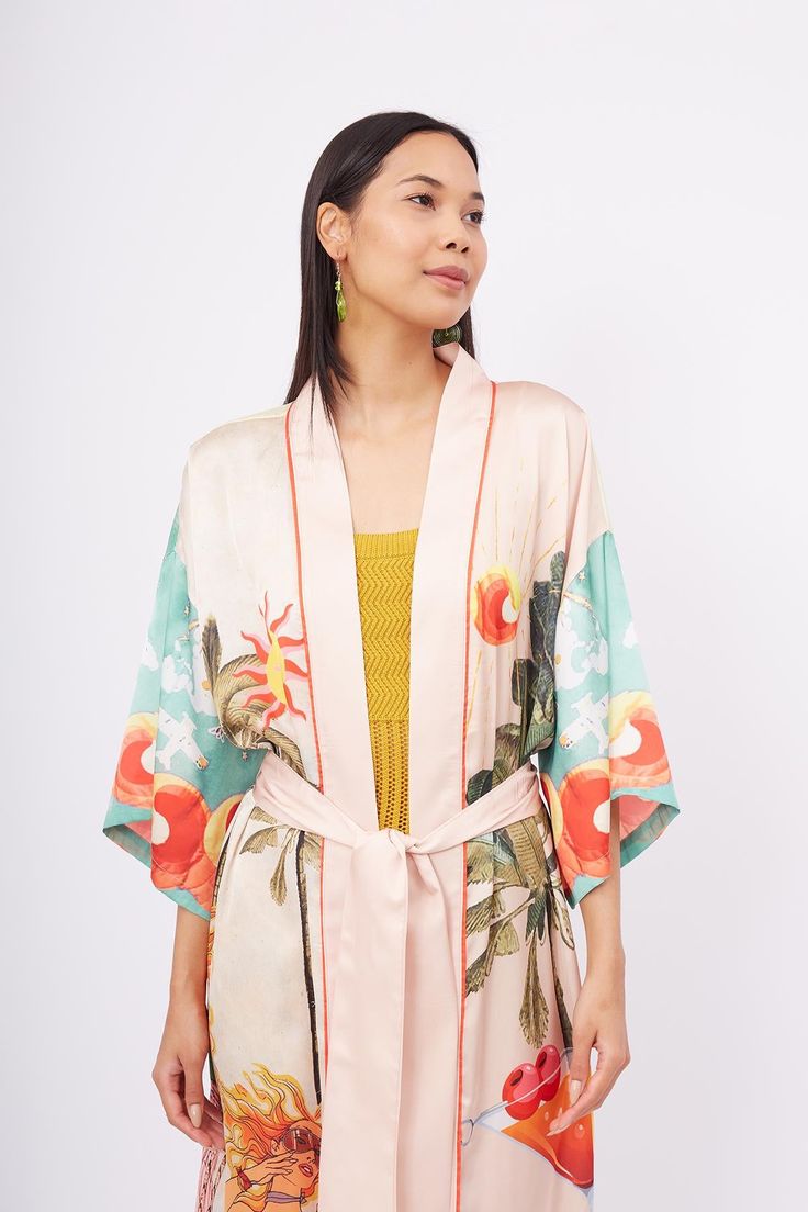 Embrace the essence of the season with the Summertime Long Satin Kimono. This luxurious kimono features vibrant summer scenes printed on high-quality satin, offering a silky-smooth feel and elegant drape. The colorful and playful design captures the spirit of summer, making it a perfect statement piece for your wardrobe.  The long silhouette and open-front design make the Summertime Kimono a versatile layering piece, ideal for adding a touch of elegance to your outfits. Whether you're lounging a Summer Scenes, Satin Kimono, Elegant Drapes, August Birthstone Jewelry, July Birthstone Jewelry, Gifts For New Mums, Pearl Jewellery Earrings, August Birth Stone, Eye Jewelry