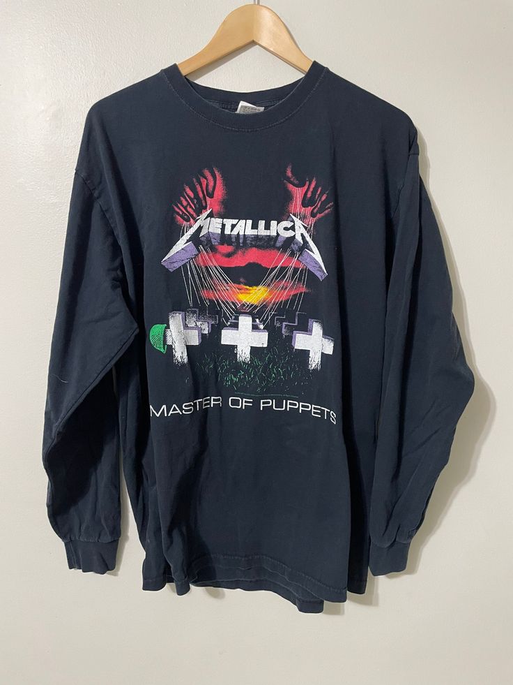 "Metallica Shirt  - Y2k licensing  - Master of Puppets album graphic  - Song list back graphic  - Fruit of The Loom tagged  Size: XL  24\" pit to pit  30\" shoulder to waist Good used condition No rips or holes  No stains on" Long Sleeve Graphic T-shirt For Concerts, Alternative Style Graphic Print Tops For Fans, Vintage Long Sleeve Tops For Concert, Band Merch Tops With Logo Print, Graphic Tee Long Sleeve T-shirt For Concerts, Graphic Long Sleeve T-shirt For Concerts, Long Sleeve Graphic Tee For Concert, Grunge Long Sleeve Graphic Top, Long Sleeve Grunge Graphic Top