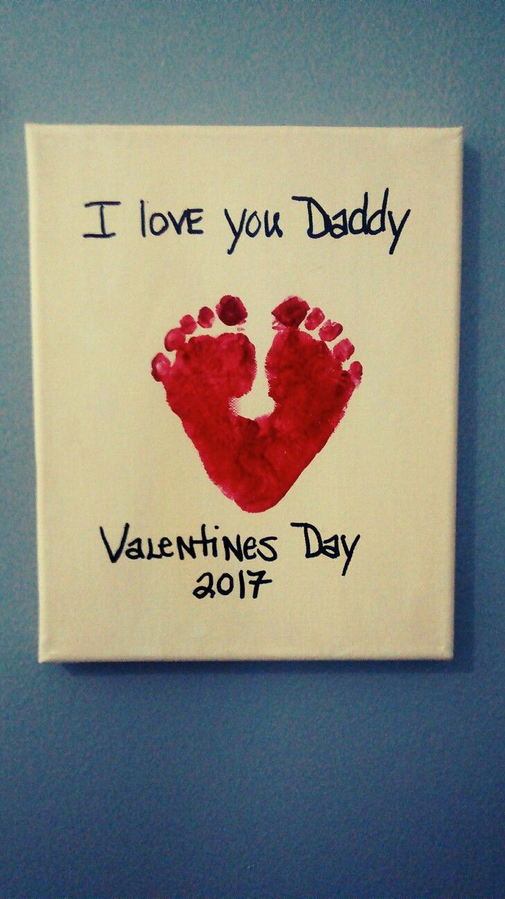 a hand and foot print on a canvas that says i love you daddy valentine's day