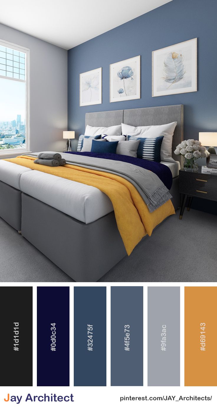 a bedroom with blue and yellow colors in the walls, carpeted flooring and furniture