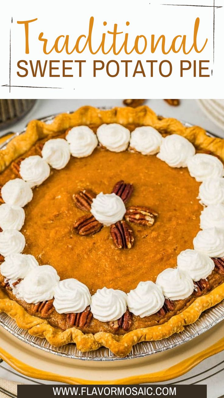 a pumpkin pie with whipped cream and pecans on top