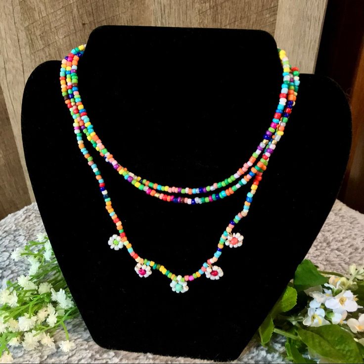 2 Pc Bohemian Flower Seed Bead Layered Necklace. Nwt! Pet Free/Smoke Free Home! Bundle To Save! If Anyone Has Any Questions Please Don’t Hesitate To Reach Out! Bohemian Flower Beaded Necklaces For Summer, Bohemian Beaded Chain Necklace For Spring, Bohemian Beaded Necklace For Spring, Colorful Bohemian Beaded Necklaces With Heart Beads, Flower-shaped Beaded Necklaces For The Beach, Spring Bohemian Beaded Necklace With Tiny Beads, Colorful Beads Spring Festival Necklace, Multicolor Beaded Chain Necklace For Spring, Spring Festival Handmade Beaded Necklaces