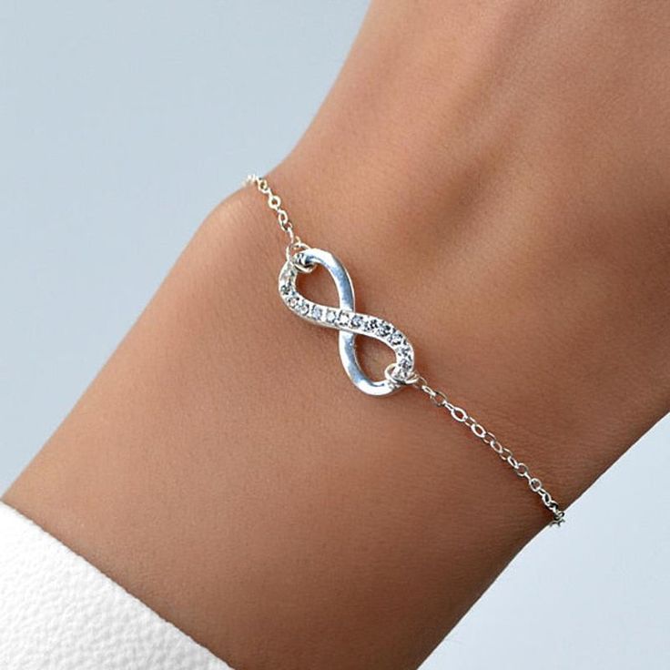 This simple, but elegant chain bracelet is beautifully delicate and features an Infinity Symbol. It's the perfect gift for your best friend, your mom, girlfriend, or even yourself! Wear the Crystal Stainless Steel Infinity Bracelet as your daily affirmation, inspiration, and reminder, that you are loved! This quality bracelet is crafted of hypoallergenic stainless steel. It's completely adjustable and can be fitted to most wrist sizes. Show your love with this beautiful Crystal Infinity Bracelet Everyone Has A Story, Forever Gifts, Infinity Necklace, Build Trust, Etsy Sales, Our Story, Sparkling Crystal, Rose Gold Color, Dainty Jewelry