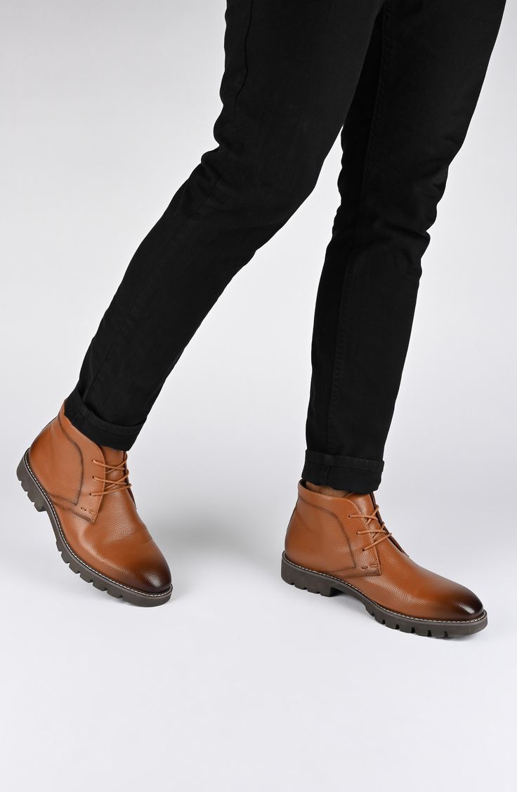 Elevate your work-to-weekend look in this refined faux-leather chukka boot featuring tonal stitch construction, breathable lining and a Tru Comfort Foam insole. Synthetic upper/textile lining/rubber sole Imported Brown Chukka Boots For Fall Workwear, Casual Cognac Boots For Work, Brown Ankle Chukka Boots For Work, Brown Ankle-high Chukka Boots For Work, Casual Brown Chukka Boots For Work, Brown Chukka Ankle Boots For Business Casual, Plain Toe Chukka Boots For Business Casual In Fall, Brown Desert Boots For Work With Plain Toe, Business Casual Chukka Boots With Plain Toe For Fall