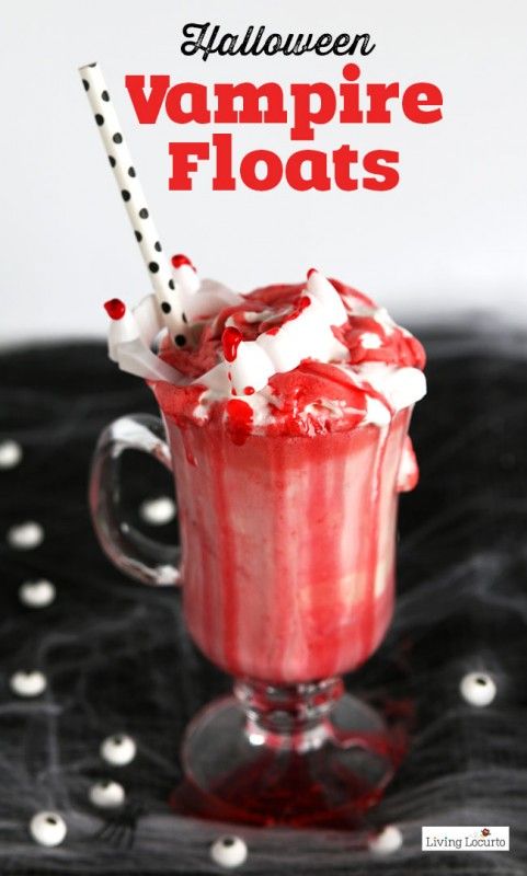 a red drink with whipped cream and sprinkles