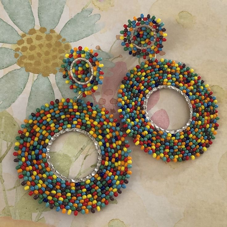 Seed Bead Earrings Colorful Hoop Earrings Tiny Bubbles Multicolored Post Stud Earrings by WorkofHeart on Etsy Multicolor Circular Hoop Earrings For Festivals, Multicolor Circular Beaded Jewelry, Multicolor Hoop Beaded Earrings With Spacer Beads, Multicolor Beaded Hoop Earrings With Spacer Beads, Multicolor Beaded Hoop Earrings For Festivals, Fun Multicolor Dangle Hoop Earrings, Multicolor Dangling Beads Hoop Earrings, Multicolor Hoop Earrings With Dangling Beads, Multicolor Circle Earrings With Dangling Beads