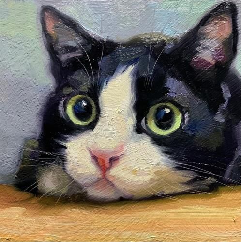 a painting of a black and white cat with green eyes sitting on a wooden table