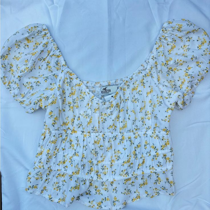 Questions? Leave A Comment Below! Trendy Yellow Summer Tops, Yellow Floral Print Top For Spring, Fitted Floral Print Tops For Daytime, Cute Fitted Yellow Tops, Trendy Yellow Crop Top For Spring, Trendy Yellow Top For Vacation, Casual Yellow Tops For Day Out, Daytime Floral Print Fitted Tops, Cute Yellow Summer Tops