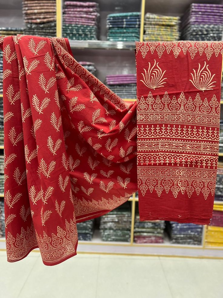 This is a beautiful organic cotton saree with handblock printed design  Fabric - Cotton Color - Rusty red  Technique - Hand block printed. Saree length - 5.5 mtr. Blouse - 1 mtr. Running but plain . Easy wash and care . Please note - color may be vary a little due to sunlight and photography . Please message us after purchasing in case you want fall and Pico done it not . No extra charges for fall and Pico but inform us . Blouse stitching is also available . Festive Cotton Traditional Wear With Batik Print, Unstitched Cotton Traditional Wear With Batik Print, Unstitched Cotton Saree, Cotton Saree With Batik Print In Traditional Drape, Red Cotton Unstitched Saree, Cotton Silk Saree With Batik Print For Festivals, Unstitched Cotton Saree With Traditional Drape, Festive Unstitched Cotton Saree, Unstitched Cotton Saree In Traditional Drape