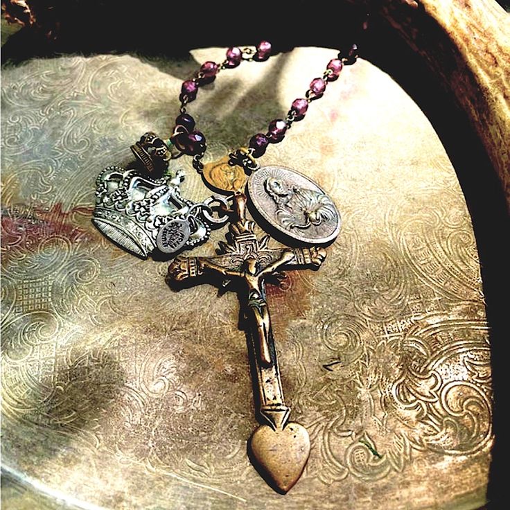 Artisan Handmade Delicate And Stunning Bronzed Sacred Heart Cross 2.2” Two Sided Religious Bronze Charm Cut Out Stamped Silver Crown Tin Charm Small Bronze Crown One Of A Kind Final Sale From Non Smoking Home Sacred Heart Cross, Crowns, Religious Medallion, Mixed Metals Amethyst Bead Rosary Approximately 20” Crown Handmade, Boho Pendant Necklace, Bead Rosary, Silver Crown, Boho Pendant, Amethyst Beads, Cross Charms, Women Artisans, Sacred Heart