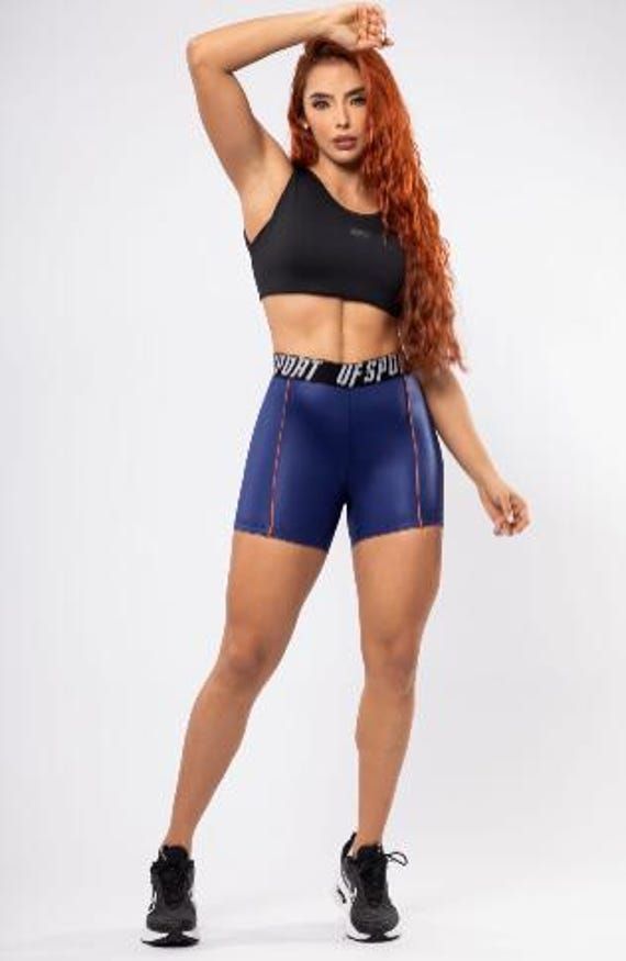 High-waisted athletic shorts with branded elastic, one size fits all expandable, featuring secure seams for high-impact training. Ladies' biker shorts, thick microfiber fabric, knitted material composition: 80% polyester, 20% elastane. Snug fit through hip, thigh, and leg opening. High rise, sits on or above the natural waist. Designed to sculpt, streamline and smooth. This fabric has a moisture-wicking finish, helping you stay comfortable and cool while you workout, with a soft sheen finish. Train in confidence with this biker short, designed to sit mid-thigh and flatter your natural shape. Whether you're heading out for a jog or running errands with the kids, our apparel is made to work out, live in, and lounge. Featuring a soft elasticated waistband. This style is fully flat seamed to e Casual Biker Shorts With Built-in Shorts For Training, High Stretch Moisture-wicking Shorts For Training, Moisture-wicking High Stretch Shorts For Training, Breathable High-waisted Athletic Shorts For Sports, High Stretch Breathable Training Shorts, Breathable High Stretch Training Shorts, High Stretch Breathable Shorts, High Stretch Sports Shorts With Short Leg, Sweat-resistant Mid-thigh Sports Bottoms