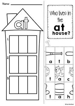 a cut out of a house with the words who lives in the at house?