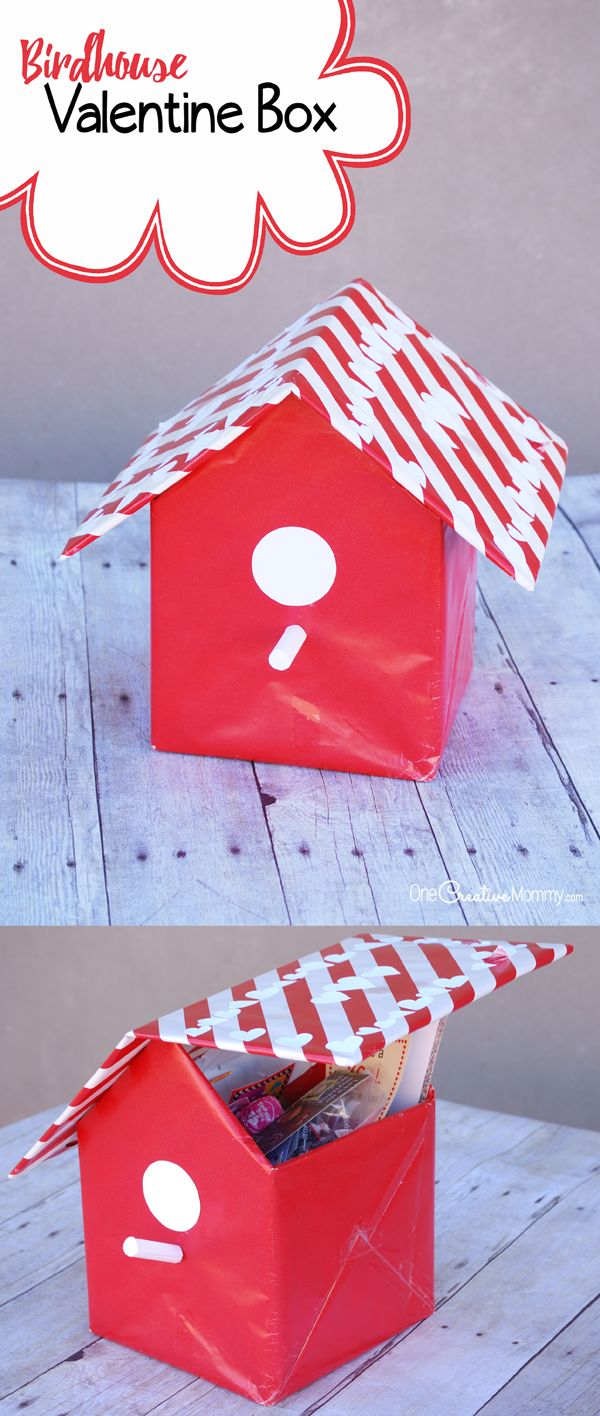 a red and white box with a paper house on it that says valentine's day