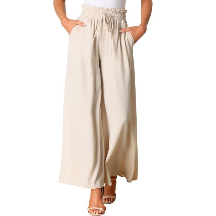 The wide-leg beach pants feature a drawstring waist, a tassel tie, and two side pockets, which are great for a perfect summer look. The soft fabric of the pants is drapey, even in the summer. It is not stuffy, showing elegant charm while relaxing. These fashionable and casual pants are perfect for spring, summer, and fall. Pair them with sandals or a hat for a glamorous look! Trousers Women Wide Leg, Wide Leg Palazzo Pants, Flowy Pants, Beach Pants, Ladies Of London, Straight Leg Trousers, Summer Look, Boho Women, Bottom Clothes