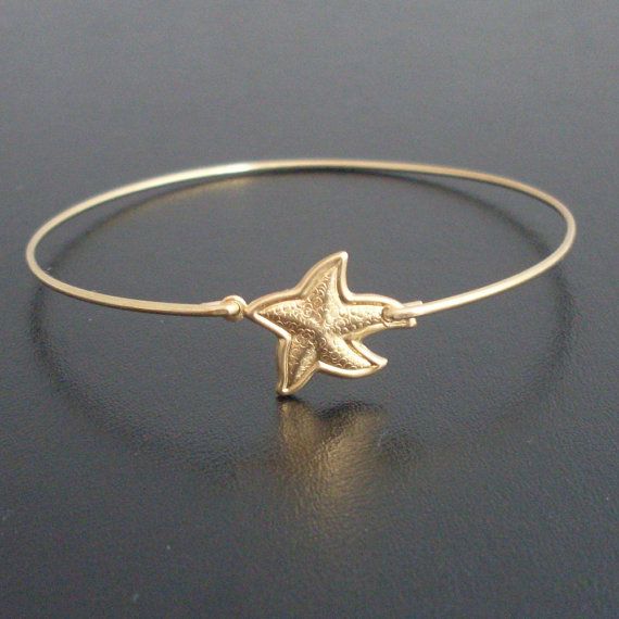 Starfish Bangle Bracelet Gold Starfish Bracelet by FrostedWillow, $15.95 Adjustable Starfish Bracelet With Lobster Clasp, Adjustable Gold Star Bracelet, Gold Charm Bracelet With Starfish For Beach, Gold Ocean-inspired Starfish Bracelets, Gold Star Charm Bracelet, Adjustable Gold Charm Bracelet Ocean-inspired, Gold Starfish Bracelet With Starfish Charm, Adjustable Gold Star Charm Bracelet, Starfish Charm Bracelet Gift