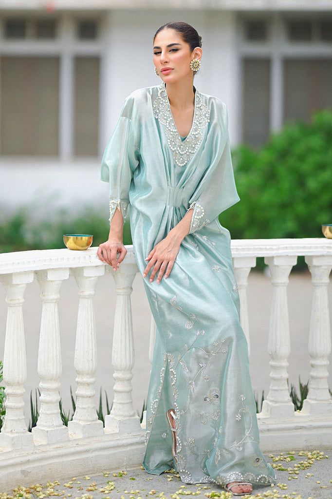 Hyra – Sania Maskatiya International Green Hand Embellished Gown For Eid, Hand Embellished Green Gown For Eid, Elegant Floor-length Summer Kurta, Elegant Summer Kurta In Maxi Length, Green Maxi Length Kaftan For Wedding, Summer Wedding Tunic Kaftan, Elegant Turquoise Dress For Festive Occasions, Elegant Turquoise Festive Dress, Elegant Designer Pista Green Dress