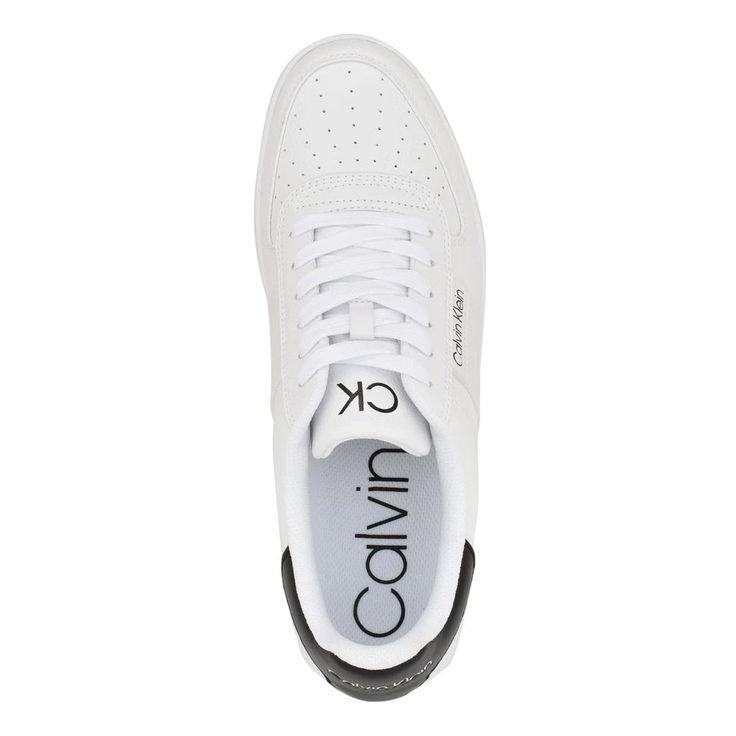 Flaunt your spory and chic style effortlessly by pairing outfits with the athletic-inspired Calvin Klein® Lento Sneakers that are crafted with faux leather upper, textile lining, and rubber insole. The modern sneakers features a lace up front, stylish round toe shape, and CK logo detailing on the side of the sneaker..Low-top design..Rubber outsole..Imported..Product measurements were taken using size 9, width M. Please note that measurements may vary by size..Measurements: Weight: 1 lb Modern High-top Sports Sneakers With Laces, Sporty Skate Shoes With Perforated Round Toe, Athleisure Slip-on Sneakers With Contrast Sole, Synthetic Platform Sneakers For Light Sports With Laces, Modern Lace-up Sneakers With Textured Sole, Modern White Synthetic Sneakers, Synthetic High-top Sneakers With Perforated Toe Box For Streetwear, Urban Sneakers With White Sole And Laces, Athleisure Lace-up Platform Sneakers With Textured Sole