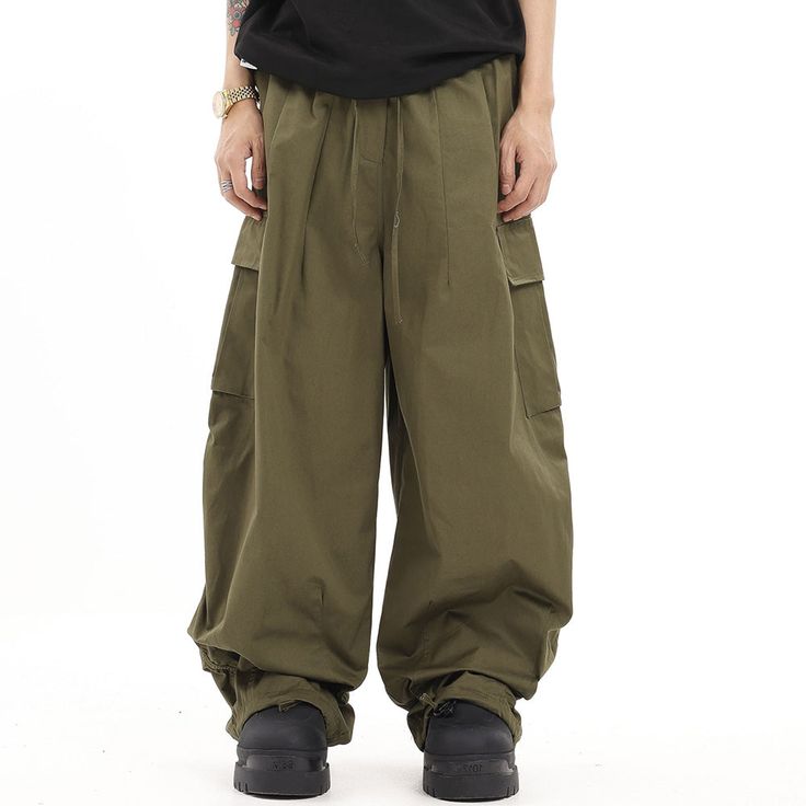 These Japanese-style cargo pants are made from a lightweight fabric and feature a folded leg design for a modern look. Crafted with a breathable material, they are comfortable for all-day wear and keep you cool in hot weather. The multiple pockets offer plenty of storage for items, while the timeless style fits any wardrobe. Features: -100% Cotton -Drawstring waistband -Multi-Pocket Design -Solid Color -Straight Leg -Baggy Fit -Unisex street style Free Scarf, Style Cargo, Free Socks, Leg Design, Hot Weather, Baggy Fits, Drawstring Waistband, Color Khaki, Japanese Style