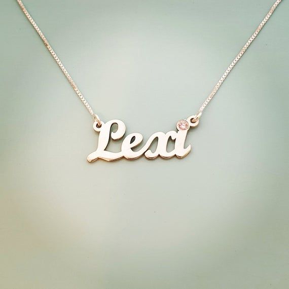 Order any word or name, for your new sterling silver 925 Lexi style name necklace!Choose any swarovski birthstone for the dot of the i, or the first capital letter .*Nameplate and chain are all solid sterling silver 925.*First capital is 1.0 cm tall (0.4 inches).*Nameplate thickness is 1.2 mm.*Choose any birthstone you would like to have placed on you name!*Choose your chain length from the menu above.*Be sure to tell me the name that you would like in the NOTE TO SELLER section of your etsy che Silver Minimalist Name Necklace For Birthday, Minimalist Silver Name Necklace For Birthday, Silver Minimalist Name Necklace For Birthday Gift, Dainty Sterling Silver Name Necklace For Birthday, Sterling Silver Name Necklace For Birthday Gift, Personalized Silver Jewelry With Names, Sterling Silver Name Necklace For Birthday, Silver Dainty Name Necklace With Birthstone, Dainty Sterling Silver Name Necklace With Birthstone