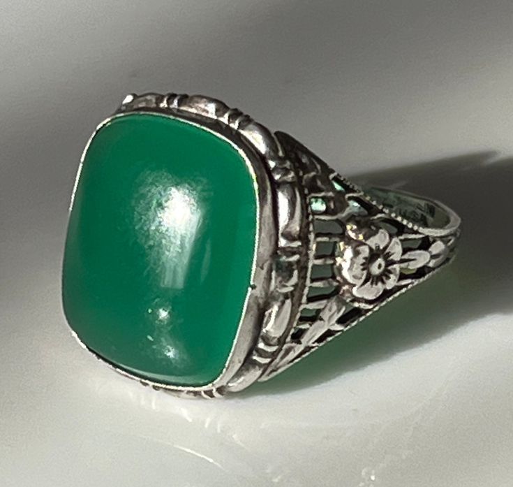 Green Rectangular Rings With Bezel Setting, Green Rectangular Bezel Set Ring, Antique Green Emerald Ring With Polished Finish, Classic Green Cabochon Emerald Ring, Rectangular Silver Emerald Ring For Formal Occasions, Classic Green Emerald Ring With Rectangular Stone, Formal Green Emerald Ring With Rectangular Stone, Formal Rectangular Green Emerald Ring, Heirloom Green Cabochon Jewelry