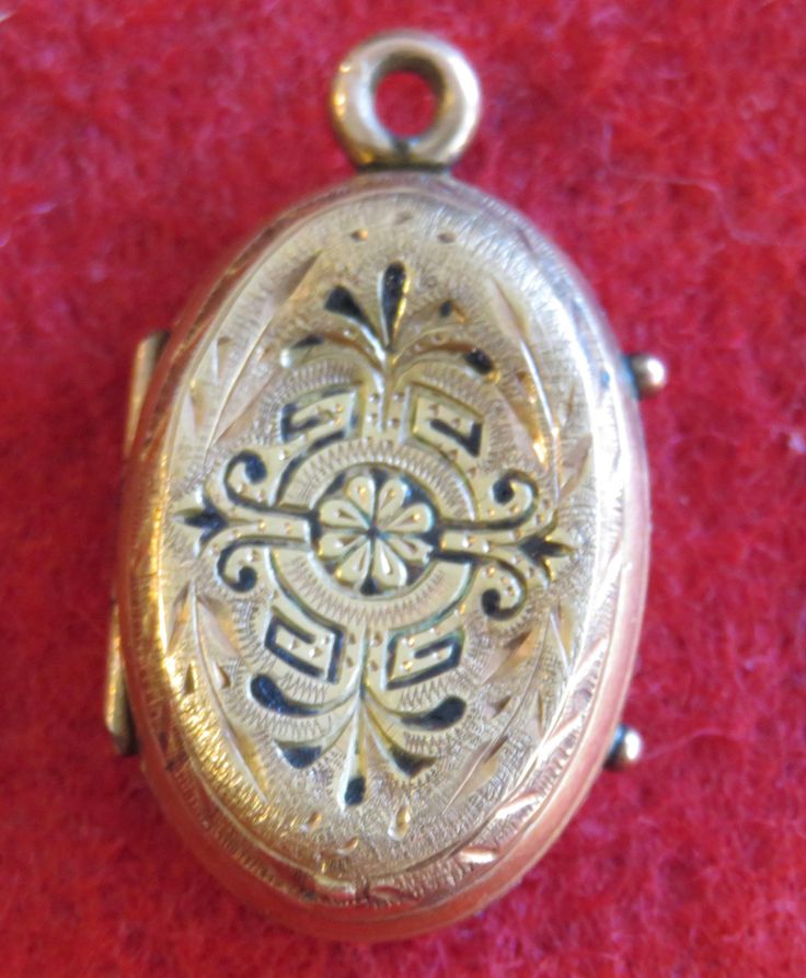 "An Awesome 1890's Victorian 14 Karat Yellow Gold Locket With Photos Necklace Pendant. Visit our shop for awesome retro photos, vintage jewelry, sports memorabilia and home decor. Size: 1/2\" across x 3/4\" high Material: 14 Karat Yellow Gold Condition: Good. Front Is Bowed In. Photos Show Wear. Year: 1890's Signed: Unsigned. Inventory #: 2280" Victorian Locket Necklaces For Vintage Events, Vintage Filigree Pendant Jewelry, Antique Gold Jewelry With Vintage Charm For Collectors, Victorian Medallion Jewelry For Vintage Events, Antique Medallion Necklace For Vintage Events, Vintage Filigree Jewelry For Vintage Events, Engraved Gold Jewelry For Vintage Events, Gold Engraved Jewelry For Vintage Events, Historical Gold Medallion Jewelry