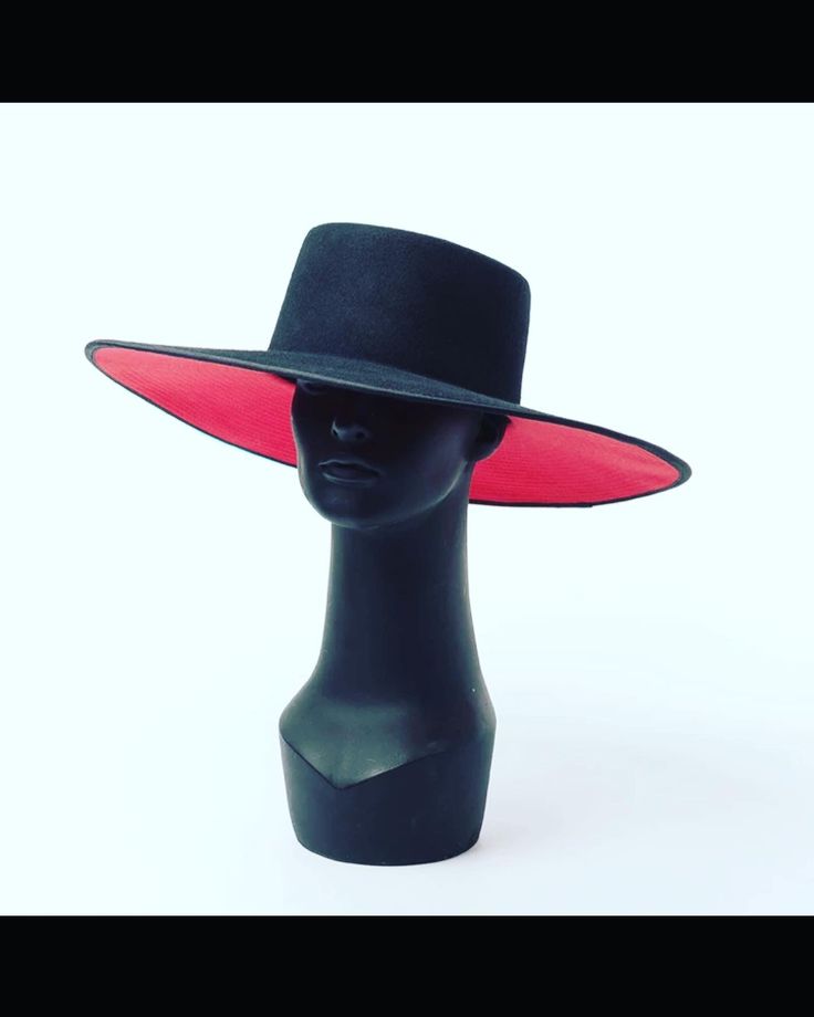 Modern Black Fedora Hat, Modern Black Hats For Spring, Modern Black Hat For Fall, Chic Black Fedora With Flat Crown, Modern Black Spring Hats, Modern Black Hat With Flat Brim, Evening Hats With Flat Brim For Fall, Flat Brim Hats For Evening In Fall, Flat Brim Hats For Evening And Fall