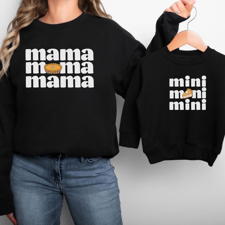 These adorable Thanksgiving matching mommy and me sweatshirts are perfect for the entire family! Available in multiple sizes and shirt styles to fit toddlers, babies, and of course mom! The sweatshirts, t-shirts, and baby bodysuits are all made of soft, high-quality fabric to keep everyone comfy and cozy this fall! How to Order Your Matching Shirts: 1) Select the Size from the dropdown menu. Select the shirt color. Then let me know in the personalization box if you would like either "Mama" or "Mini." Click "Add to Cart". 2) Go back to the listing, select the second size (for the second person), add the color, and tell me either "Mama" or "Mini" and click "Add to Cart" again. 3) Repeat for as many sizes as you would like.  4) Once all the desired sizes are added to your cart, proceed to che Mom And Son Thanksgiving Outfits, Family Matching Graphic Print Sweatshirt, Family Matching Long Sleeve Letter Print Tops, Family Matching Black Tops For Fall, Long Sleeve Tops With Name Print For Family, Black Family Matching Tops For Fall, Family Matching Crew Neck Sweatshirt For Mother's Day, Long Sleeve Tops With Letter Print, Mother's Day Family Matching Crew Neck Sweatshirt