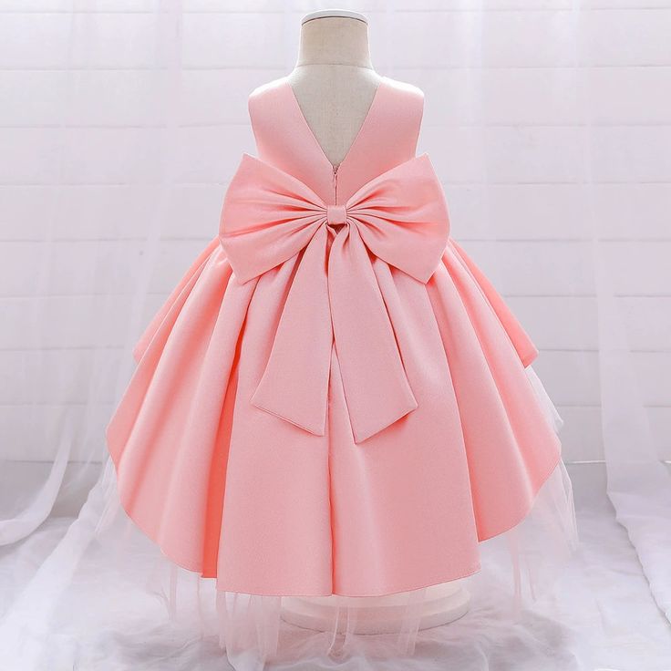 This Princess Round Tea Length Satin Flower Girl Dress in Pink is perfect for special occasions such as baptisms, birthdays, holidays, and weddings. Made with elegant satin fabric, it features a charming round neckline, sparkling beaded embellishments, and a lovely bow back. Its tea length silhouette adds a touch of sophistication, making any little girl feel like a princess. Baby Girl Princess Dresses, Satin Flower Girl Dress, Girl Tutu Skirt, Birthday Party Outfits, Girl Princess Dress, Childrens Dress, Birthday Party Dress, Girls Dresses Summer