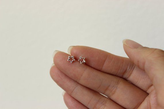 These are very cute stud earrings .  They are made of 925 sterling silver ( not silver plated) so they are safe for you if you have an allergy. They will come with sterling silver  butterfly earnuts.Measure: 5 mmIf you want to purchase a single stud as a cartilage earring, nose stud or tragus earring, please go to the " one stud" section of my shopShipping charge for the first item is $3.00 (in the US ) or $7.50 (for international). After the first item, shipping for each additional item will co Rose Gold Star Earrings For Gift, Cute Silver Star Jewelry, Cute Tiny Sterling Silver Earrings, Tiny Cute Sterling Silver Earrings, Dainty Silver Earrings For Birthday, Dainty Sterling Silver Star Earrings, Dainty Star-shaped Earrings For Anniversary, Handmade Dainty Star Earrings, Dainty Sterling Silver Earrings With Star Charm