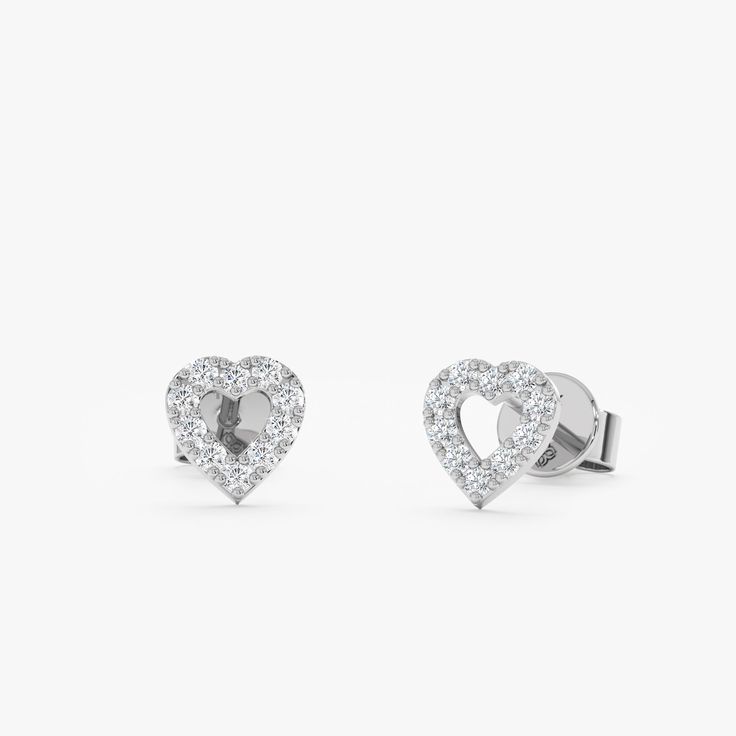 Penelope Add a touch of romance with these delicate Heart Outline Diamond Studs. Crafted from solid gold (available in yellow, white, or rose gold), they feature a classic heart design outlined with sparkling diamonds. Perfect for everyday wear or special occasions, these versatile earrings can be dressed up or down. They make a perfect gift for a loved one or a special treat for yourself. - Handmade- Solid Gold- Natural Diamonds - G Color, SI Quality Diamonds- Total Diamond Carat Weight: 0.20 c Heart-shaped Diamond Halo Jewelry, Classic Heart Earrings With Diamond Accents For Formal Occasions, Classic Heart Earrings With Diamond Accents For Formal Events, Luxury Diamond Heart Earrings For Gift, Classic Diamond Heart Earrings, Classic White Diamond Cut Heart Earrings, Elegant Rose Gold Diamond Heart Earrings, Elegant Double Heart Jewelry With Brilliant Cut, Classic Heart Earrings With Diamond Accents For Anniversary