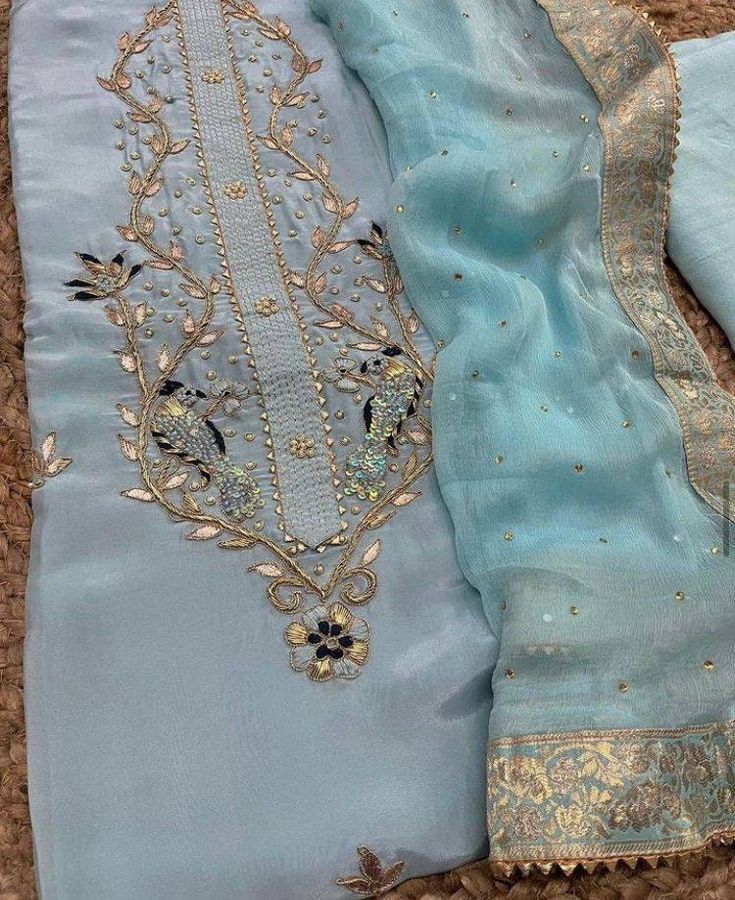 Item Overview ATHARVA Hand Embroidery Salwar Kameez/Blue Grey Crepe Silk/Banarsi Border Chiffon Dupatta/Custom Stitch Unstitch/Anarkali/Gift/Plazzo Dno. CH2132B Fabric:  * Shirt - Crepe Silk- Hand Embroidered Neck 2.5 Mts - Beautiful Hand Embroidery  * Dupatta: Chiffon Chinnon Dupatta- Banarsi Zari Border - 2.5 Mts- Latkans Tassels  * Bottom Santoon Silk 2.5 Mts. Excusive Hand Embroidered Party Wear Punjabi Suit. Customization: * Fabrics Customization: Designs Can be made in different Fabrics. * Patiala Salwar Kameez, Sky Blue Weddings, Pearl Work, Embroidered Suit, Chanderi Suits, Indian Salwar Kameez, Outfits Woman, Salwar Kamiz, Patiala Salwar