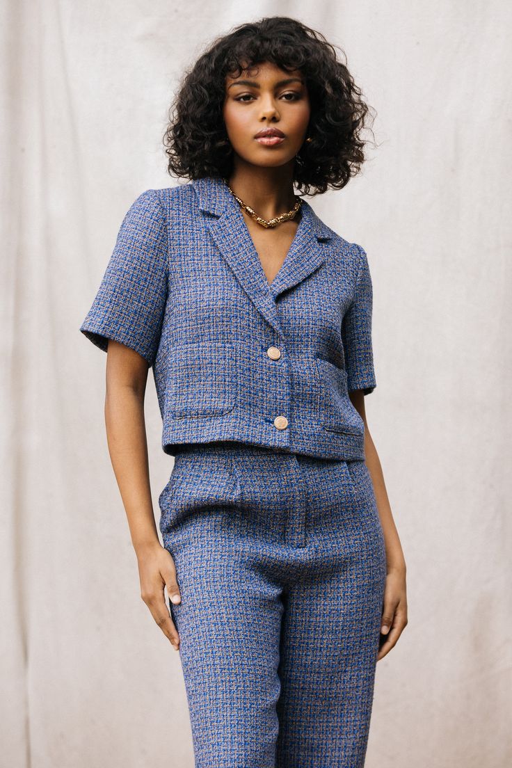 A tailored tweed jacket, updated for the warmer seasons. This cropped number is designed with notched lapels, patch pockets, and embossed buttons at the front. It wears especially well as a set with our matching tweed pants. •Short sleeves •Notched lapels •Button front placket •Patch pockets •Cropped Item Number: 25790 100% POLYESTER Vacation Dresses Casual, Wedding Guest Dress Trends, Tweed Pants, Pants Short, Casual Wedding Dress, Cropped Blazer, Sweater Sale, Trending Dresses, Tweed Jacket