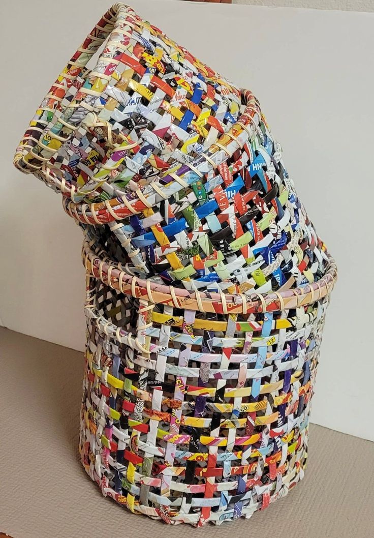 three woven baskets are stacked on top of each other