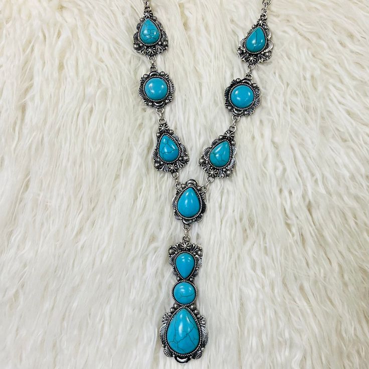 Cheap Turquoise Necklaces For Festivals, Southwestern Style Turquoise Dangle Necklace, Southwestern Style Adjustable Teardrop Necklace, Blue Teardrop Western Style Jewelry, Western Style Teardrop Silver Jewelry, Western Style Silver Teardrop Jewelry, Adjustable Teardrop Turquoise Necklace, Blue Teardrop Bohemian Drop Necklace, Turquoise Teardrop Necklace In Southwestern Style