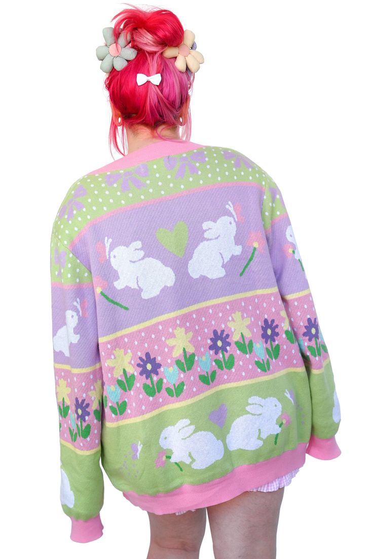 Spring is here and we have the cutest sweater for you!! Bunnies, butterflies, and flowers decorate this pastel sweater. 100% Cotton. Model is a size XL wearing the XL/2X Limited Edition.Part of our My Violet Originals! Designed and fit in Los Angeles by us, made in partnership with our reputable production team in China Cute Crew Neck Cardigan, Cute Crew Neck Sweater For Spring, Cute Long Sleeve Spring Sweater, Spring Kawaii Long Sleeve Sweater, Pink Knit Sweater With Floral Print, Kawaii Spring Sweater, Cute Long Sleeve Spring Cardigan, Kawaii Cotton Sweater For Spring, Cute Spring Crew Neck Cardigan