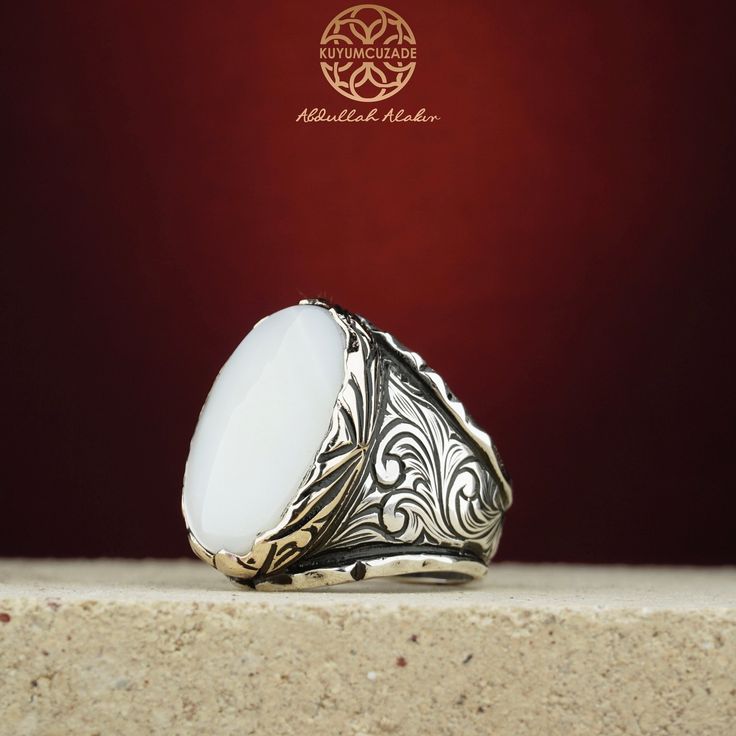 Stone Type: Mother of Pearl -Stone Dimensions: 1.8 cm x 2.5 cm -Metal Type: Sterling Silver(925k) & Bronze Details (Yellow Part) -Weight of the Item: 25 gr (Approx.) All items comes in a special gift box. If you don't see your size, please ask, we may produce your size. You are looking at the high quality handcrafted silver ring. All of our items have been designed and produced by ourselves ,so all our items comes with 1 year warranty as well. Elegant White Signet Ring For Formal Occasions, White Pearl Ring With Polished Finish For Anniversary, Classic White Oval Moonstone Ring, Classic White Pearl Ring With Polished Finish, Luxury White Signet Ring With Polished Finish, White Sterling Silver Rings Engraved, Elegant White Gemstone Signet Ring, White Oval Luxury Signet Ring, Modern White Oval Signet Ring