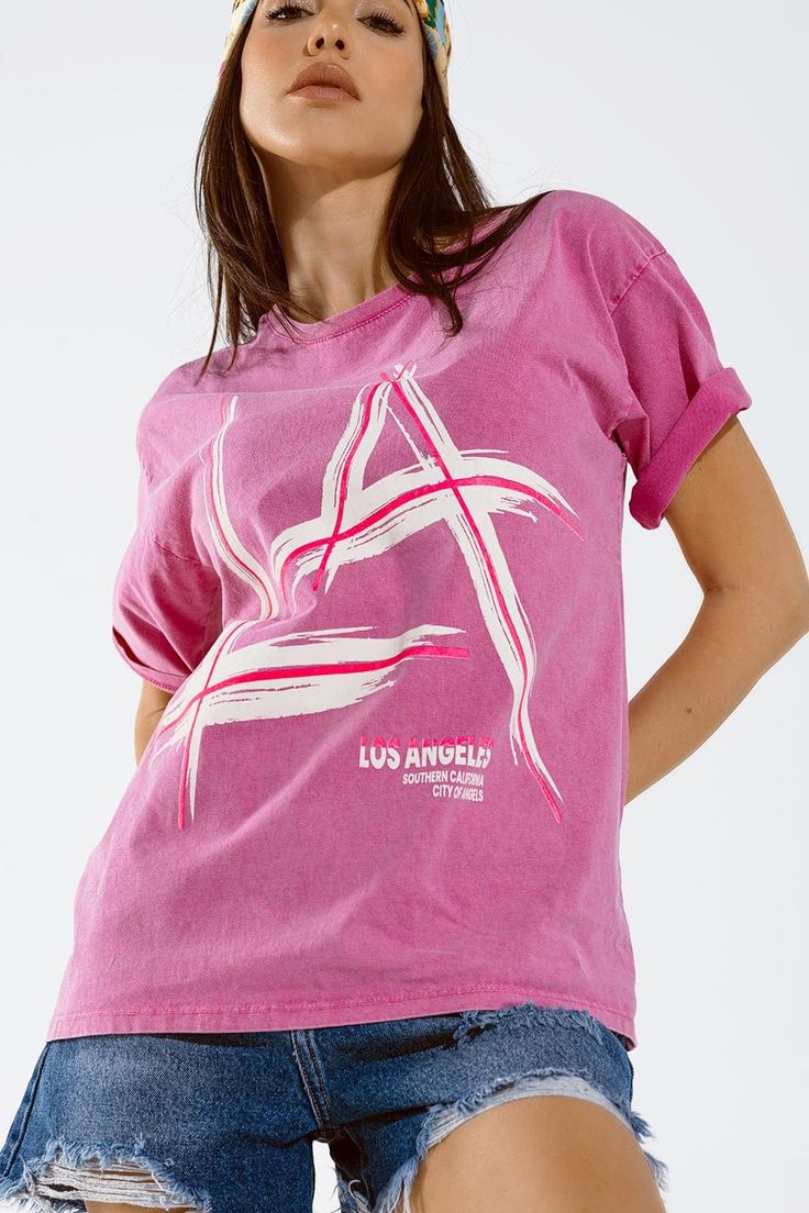 Introducing our White and Fuchsia Oversize T-Shirt with Prints, proudly featuring the iconic "LA Los Angeles". This piece is not just a garment; it's a statement, crafted with care and precision in Italy to ensure both style and quality.  The crew neckline and short sleeves make this T-shirt a comfortable and versatile choice for your daily wear. The oversize fit adds a contemporary and laid-back vibe, allowing for easy pairing with various bottoms for different occasions.  Emblazoned with bold text to the front, declaring the spirit of Los Angeles, this T-shirt is more than just fashion—it's a symbol of style and attitude. The 100% Cotton construction ensures a soft and breathable feel, making it an ideal choice for your everyday comfort.  Our model, showcasing the size U, stands at 5'9'' Oversized Pink Top With Text Print, Pink Relaxed Fit T-shirt With Logo Print, Pink Relaxed Fit T-shirt With Text Print, Pink Soft-washed T-shirt With Crew Neck, Pink Soft-washed Crew Neck Top, Soft-washed Pink Crew Neck Top, Pink Soft-washed T-shirt For Streetwear, Relaxed Fit Pink Tops With Letter Print, Soft-washed Pink T-shirt For Streetwear