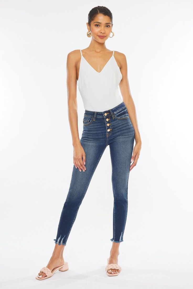 Our Jenny ankle skinny jeans are the perfect skinnies to add to your collection! Features beautiful fading, whiskering, a raw frayed hem with slight distress detail. These jeans also come with an elegant rose gold button fly and a regular 5 pocket design. Regular 5 pockets, Single button front closure, Zip fly 9.5" Rise / 27.5" Inseam (Size 5/26) 74% Cotton, 15% Polyester, 10% Rayon, 1% Spandex Model in size 25 Style # : KC9142D Stretchiness Level >> Stretch Flying Monkey Jeans, Stretchy Jeans, Jean Top, Skirt Leggings, Dress Romper, Perfect Match, Jeans Fit, Levi Jeans, High Rise