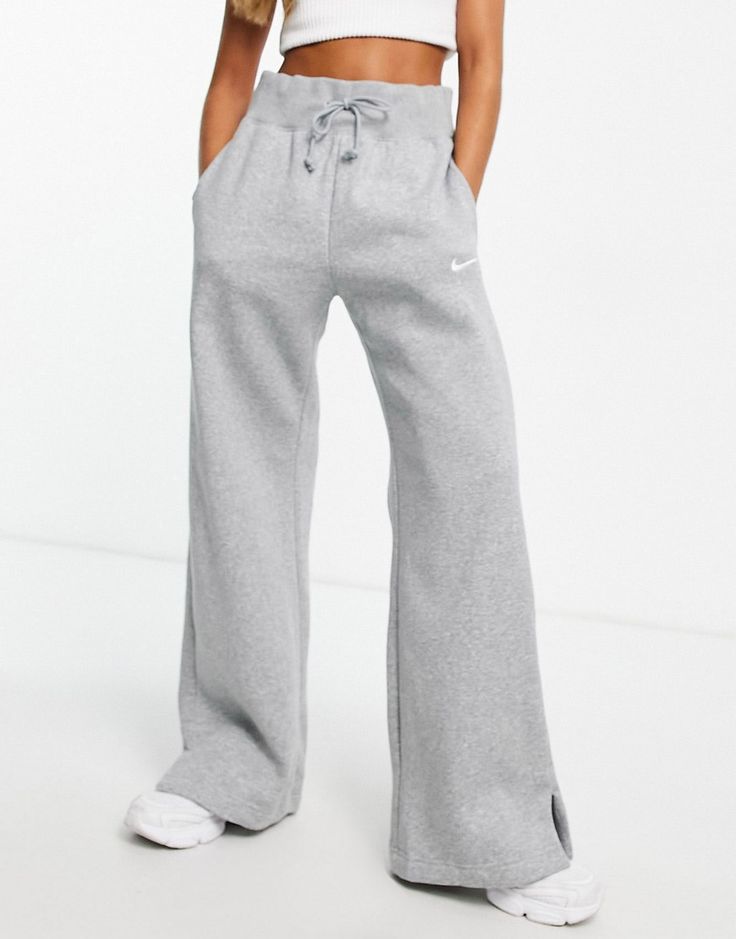 Joggers by Nike Can't go wrong in sweats Elasticated drawstring waist Side pockets Logo embroidery Wide leg Wide Joggers, Wide Sweatpants, Nike Phoenix Fleece, Nike Sweats, Wide Leg Sweatpants, Sweat Pants, Pajama Sets, Logo Embroidery, Dream Clothes