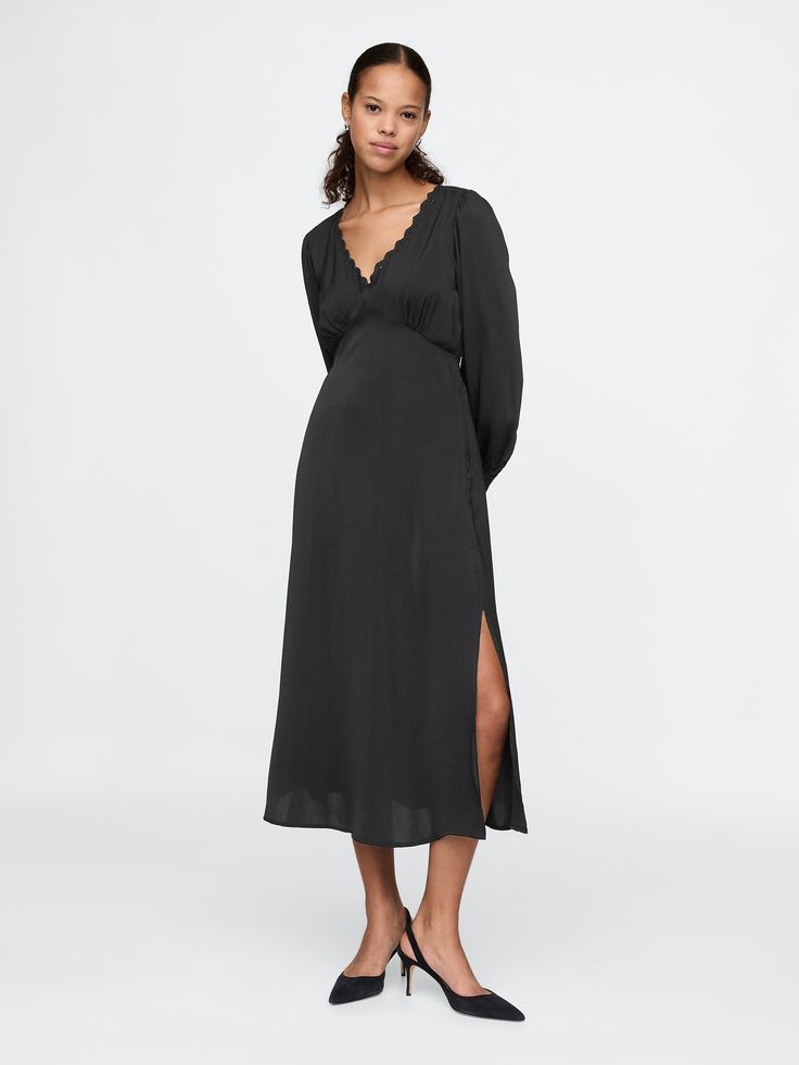 Soft satin midi dress.  Lace-trim V-neck.  Long sleeves.  Empire waist.  Slit at the hem.  Fit: Slim.  An A-line silhouette that sits close to the body with a flared opening.  Hits below the knee.  Models wearing Gap Amazon Black Dress, Midi Dress Black, Black Long Sleeve Dress, Satin Midi Dress, Mom Dress, Lace Midi Dress, Dress Lace, Black Midi Dress, Empire Waist