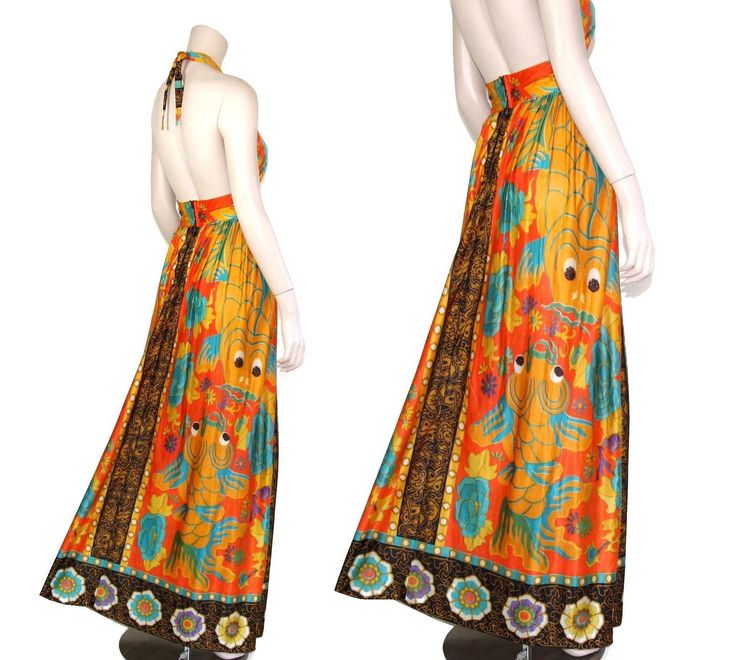 "This 60s or 70-era novelty dress features a stunning orange & black koi print fabric, adjustable halter bodice, fitted waist, and maxi length skirt. The koi fish depicted on this incredible dress are symbols of luck, wealth, and prosperity in many Eastern Asian cultures. Dress has a lined bodice and zips up the back. Best fits size xs or small (please check measurements below). Accessories not included. Payment plans available. Approximate Flat Measurements: Multiply times 2 for bust, waist Retro Summer Maxi Dress With Vibrant Print, Fitted Orange Maxi Dress For Beachwear, Retro Orange Maxi Dress For Beach, Retro Orange Maxi Dress For The Beach, Orange Retro Maxi Dress For Summer, Retro Orange Maxi Dress For Summer, Orange Retro Summer Maxi Dress, Fitted Maxi Dress With Vibrant Print For Beach Season, 1970s Style Summer Floor-length Dresses