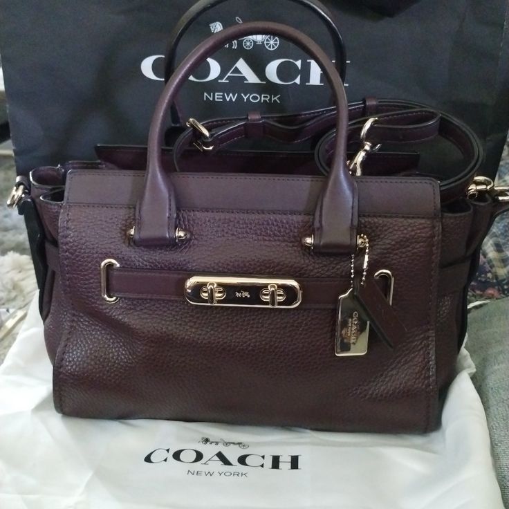 Has Been Used But In Very Good Condition Still Has That Brand New Smell Genuine Leather. There's A Lifetime Warranty To Get These Bags Fixed Just Enter And The Serial Number That's In The Bag. It Also Comes With A Strap. Coach Textured Leather Rectangular Bags, Luxury Coach Leather Bag, Luxury Leather Coach Bag, Coach Textured Leather Bag For Formal Occasions, Formal Coach Bag With Textured Leather, Formal Coach Textured Leather Bag, Coach Textured Leather Satchel, Coach Textured Leather Shopping Bag, Designer Coach Satchel With Branded Hardware