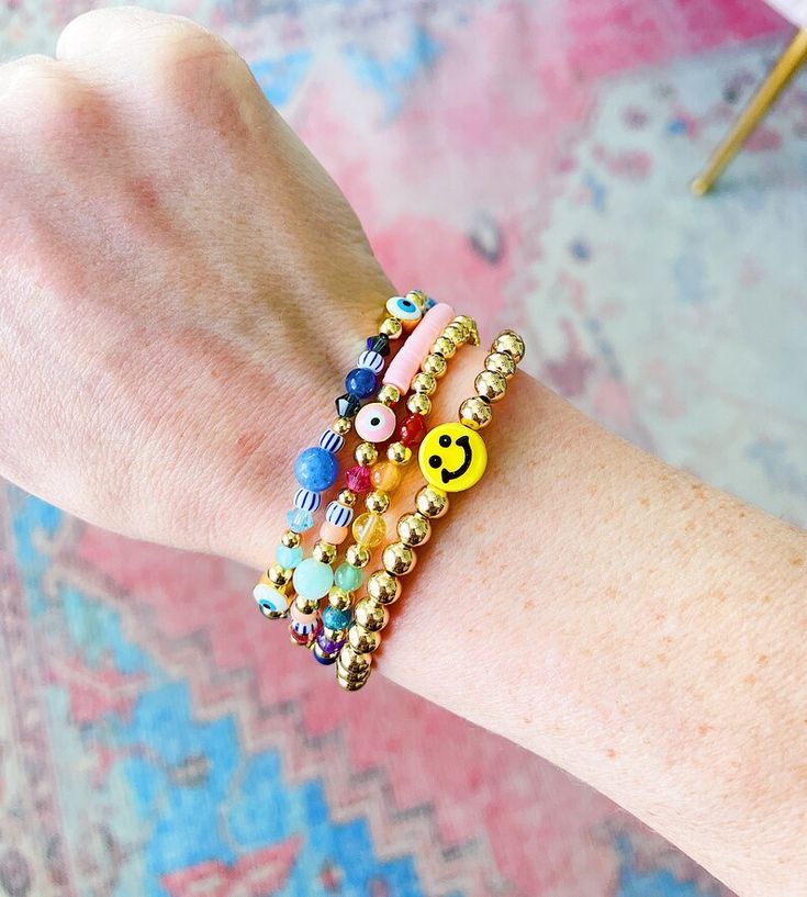 Smiley Face Bracelet Gold-filled Smiley Face Bracelet Beaded - Etsy Gold Friendship Bracelets With Colorful Beads For Birthday, Birthday Gold Friendship Bracelets With Colorful Beads, Playful Gold Beaded Bracelets For Everyday, Gold Evil Eye Bracelet With Letter And Round Beads, Playful Gold Friendship Bracelets With Letter Beads, Playful Gold Jewelry With Round Beads, Everyday Beaded Bracelets With Smiley Face, Fun Gold Bracelets With Letter Beads, Fun Gold Beaded Bracelets With Letter Beads