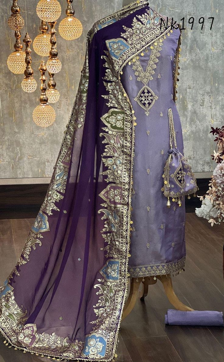 ⚘Fabric: * Shirt- Embroidered Shimmer tissue with coin lace- 2.5 Mts * Dupatta: Organza Dupatta with banarasi weaving, gotta detailing and coin lace Dupatta 2.5 Mts. * Bottom: Dhupian silk Bottom 2.5 Mts. Excusive Hand Embroidered Party Wear Punjabi Suit Dupatta. Please check the availability of the product before ordering. ⚘https://thedesigncastlein.etsy.com Watsapp: +91 9855692300 Care: * Dry Clean/ Avoid direct Ironing on Embroidery Part. * Lining is required with this fabric Colors may wary Due to different resolution on Different phones Dispatch from Punjab India. We are manufacturer. We can do custom designs & Stitching also. SHIPPING POLICY We Ship Worldwide from INDIA We ship your items within 1 Week (For Unstitched) & 2 Weeks ((For stitched) of receiving confirmed payment. Items a Traditional Churidar With Intricate Embroidery In Organza, Eid Traditional Wear With Zari Work On Dola Silk, Organza Lehenga With Dabka For Eid, Unstitched Jamawar Sharara With Dupatta, Festive Wedding Organza Churidar, Traditional Organza Salwar Kameez For Wedding, Dola Silk Sharara With Dabka For Transitional Season, Traditional Wedding Salwar Kameez In Organza, Festive Salwar Kameez With Intricate Embroidery For Eid