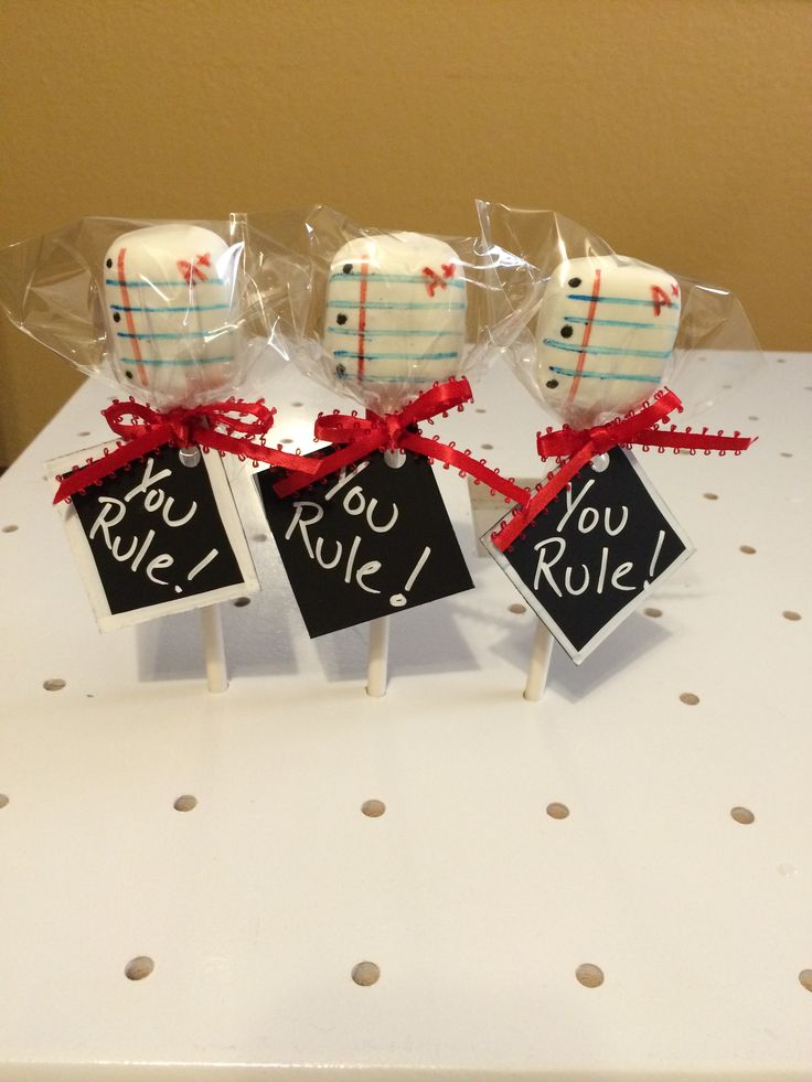 some cake pops are sitting on a table